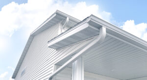 A white house with white gutters
